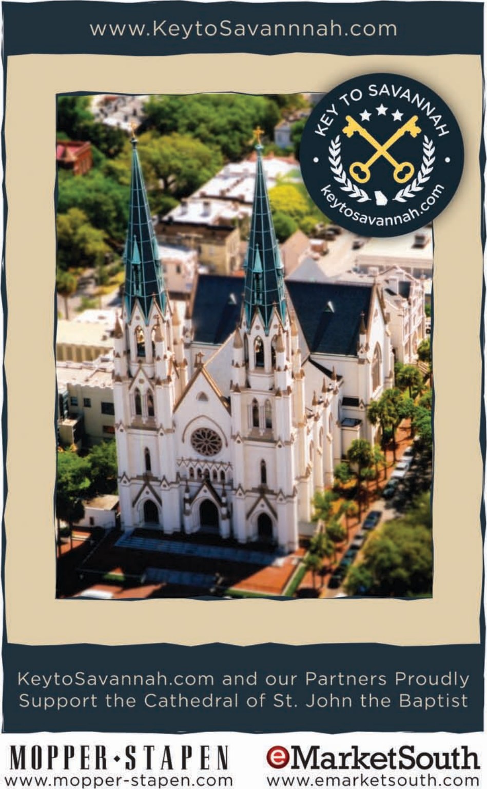 A partner ad: an aerial tilt-shift photograph of the cathedral and its square, with KeytoSavannah.com and our Partners Proudly Support the Cathedral of St. John the Baptist