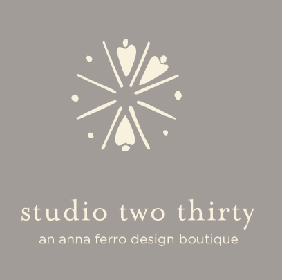 First-round concept: an open starburst above studio two thirty, on warm gray