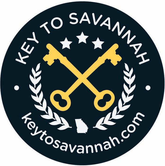 The Key to Savannah seal: two crossed gold keys beneath three white stars, wrapped in laurel, with a small outline of Georgia, on navy, ringed by Key to Savannah and keytosavannah.com