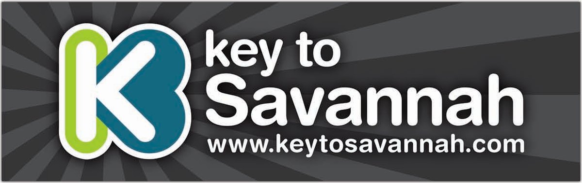 The taxi topper: a bold green and teal K beside key to Savannah and www.keytosavannah.com in white on charcoal